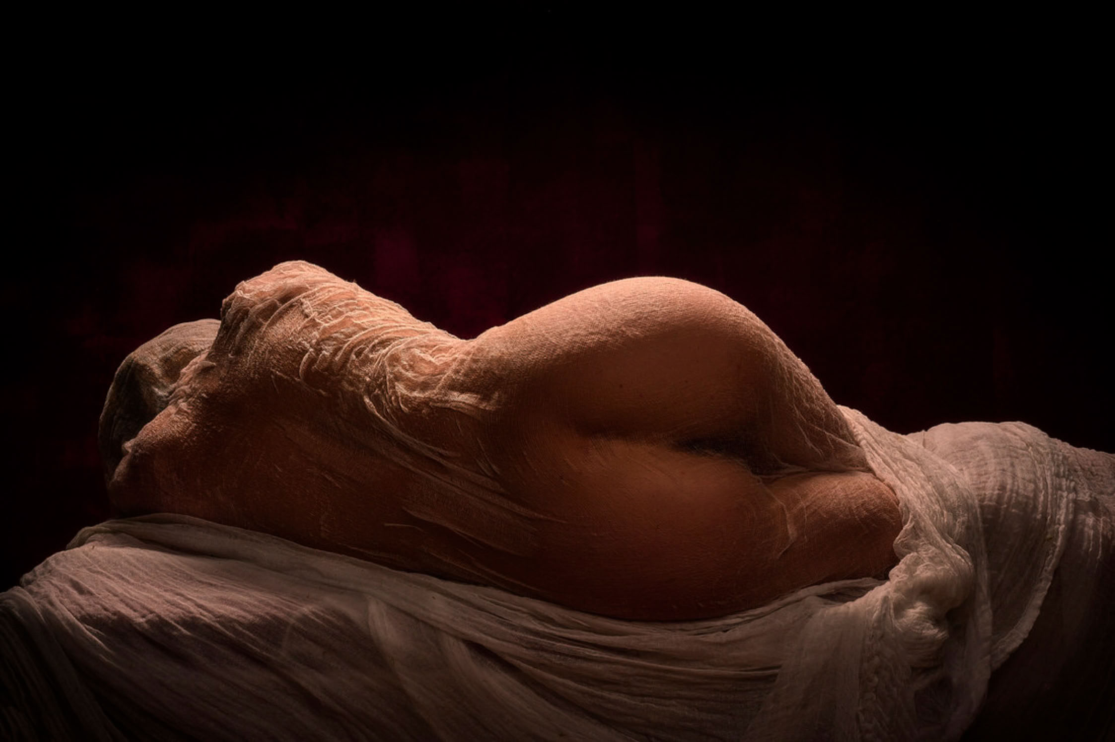 Incarno – fine art photography artwork by RAN ART, showing the human form with sculptural light and shadow in a quiet poetic atmosphere.